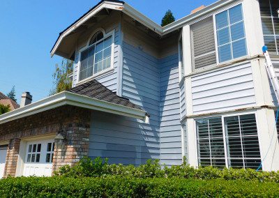 The Front Section of a House in a Light Blue Color House